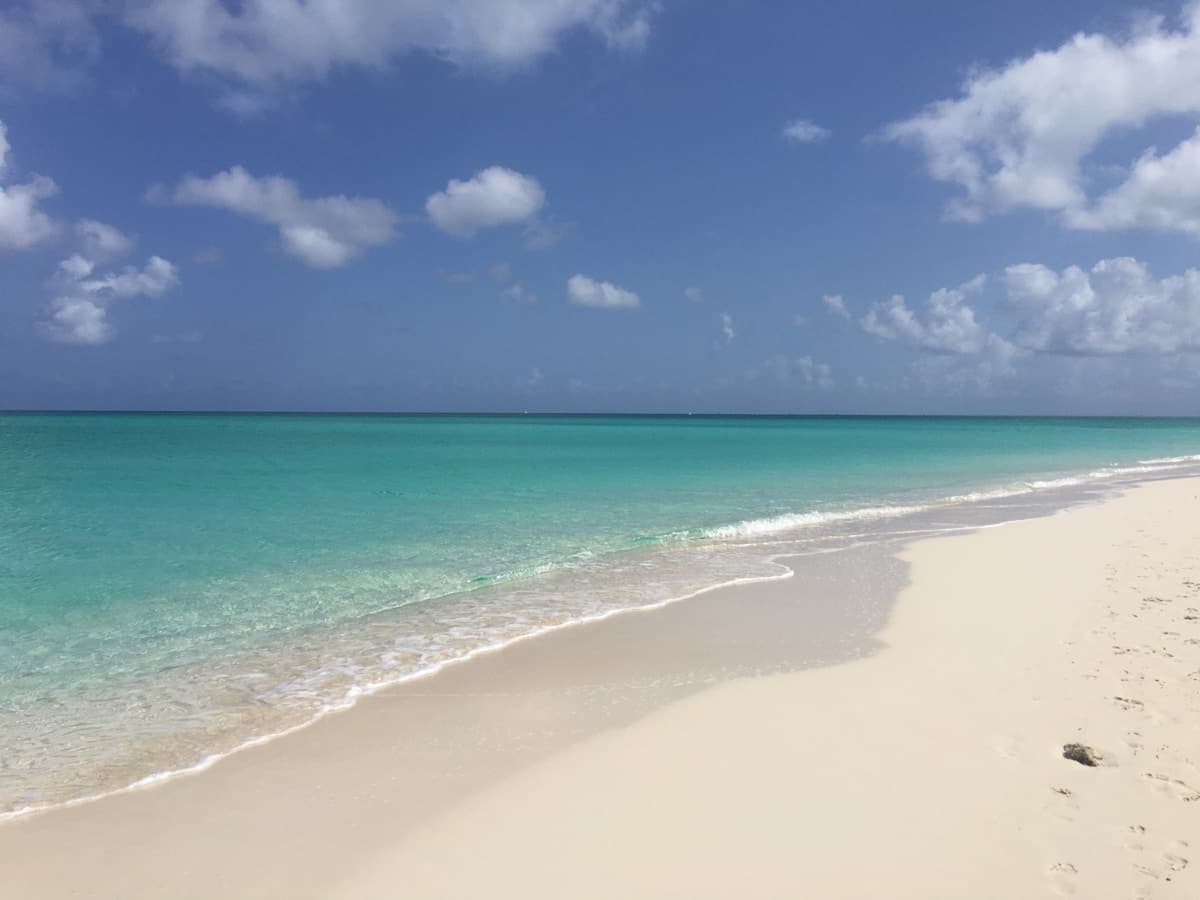Powder white sand and crystal clear turquoise water at Grace Bay Beach in Providenciales Turks and Caicos