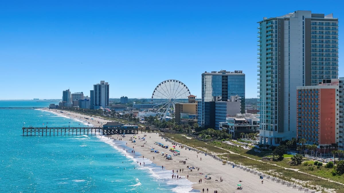 Myrtle Beach boardwalk and coastline at sunset