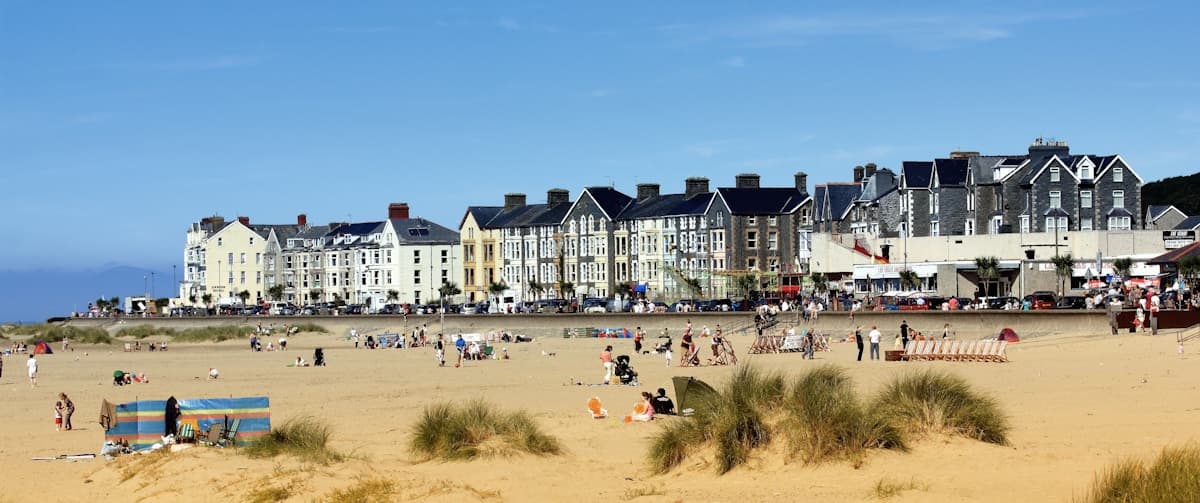 Sandy beach in Wales near Birmingham with blue sky