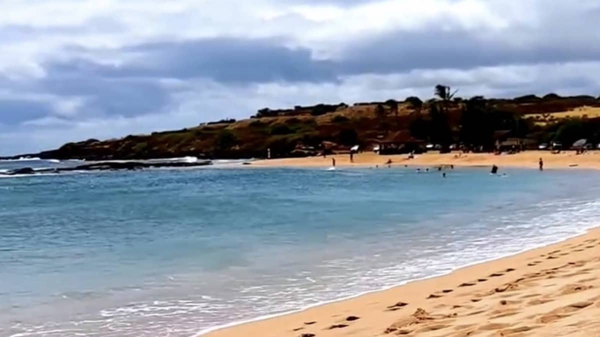 Salt Pond Beach Park crescent cove in Hanapepe Kauai with reef-protected calm water