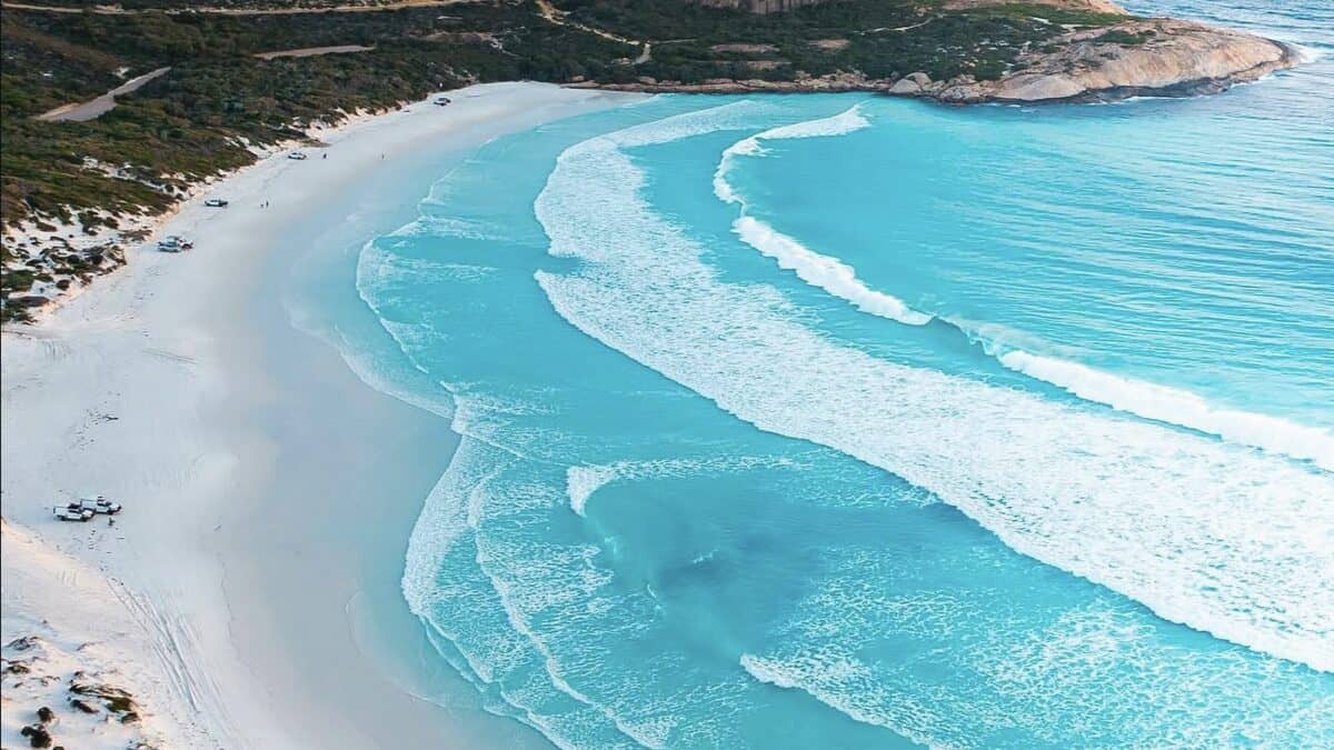 Wharton Beach near Esperance, Western Australia: the curving 4.5km arc of white sand and turquoise water seen from the elevated lookout above the bay