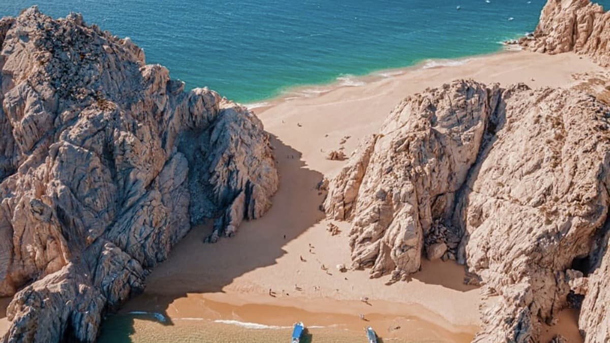 Lover's Beach (Playa del Amor) in Cabo San Lucas with the iconic El Arco rock formation in the background