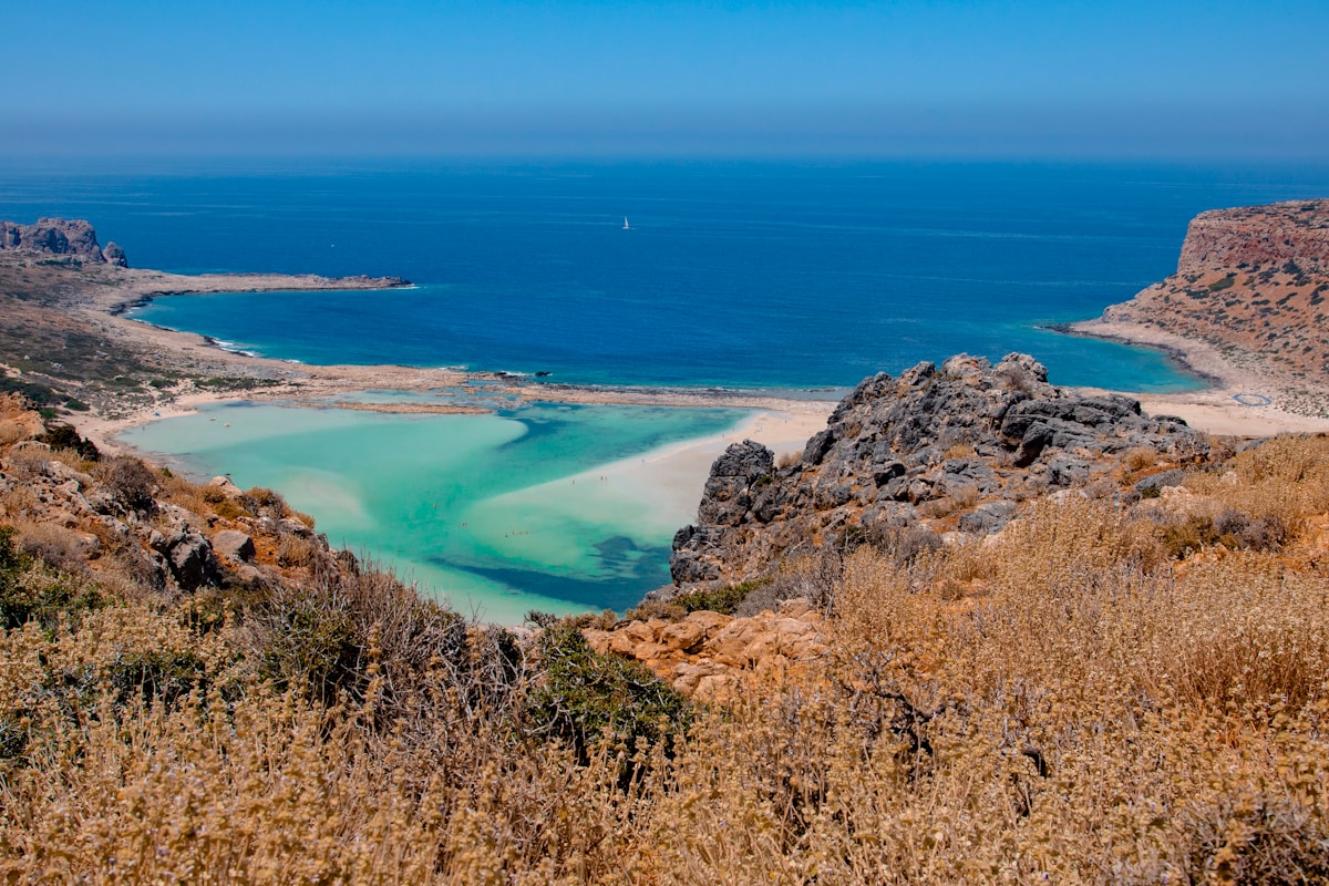 The turquoise lagoon at Balos Beach in Crete with shallow crystal-clear water