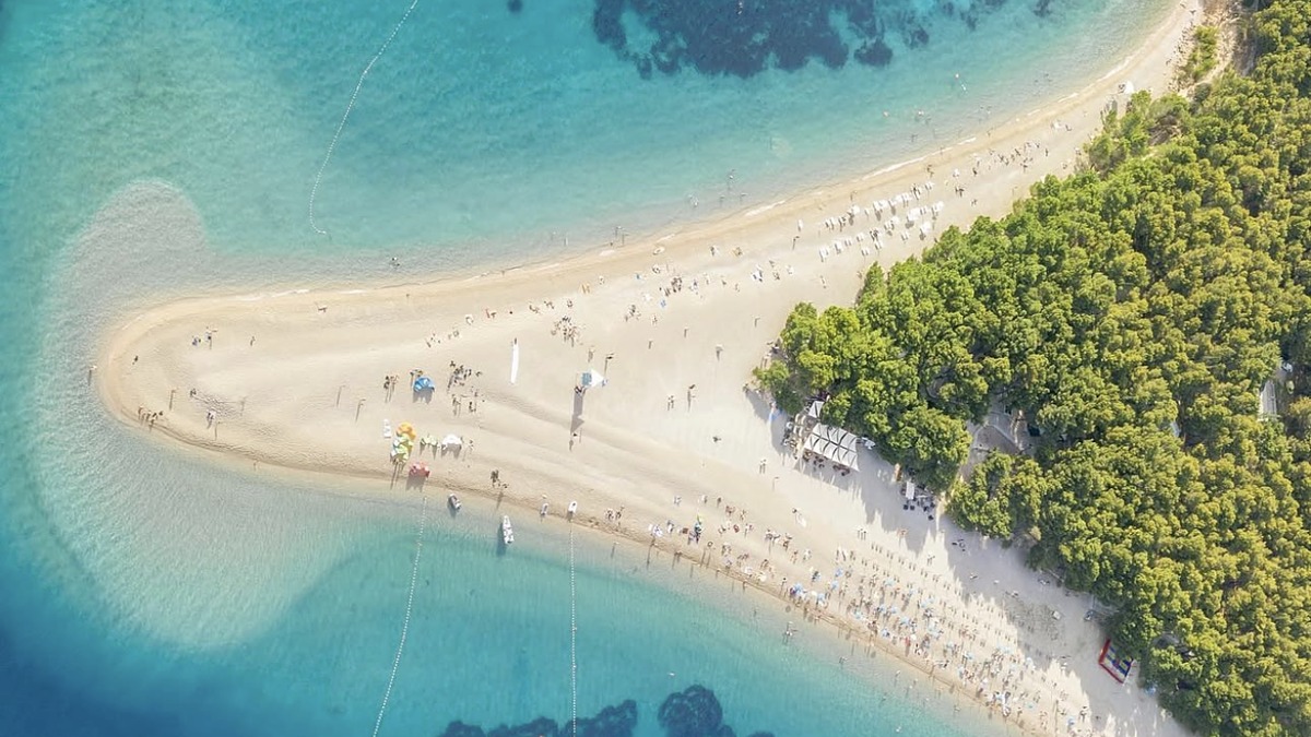 Zlatni Rat on Brac island, the white pebble spit reaching into deep blue Adriatic water