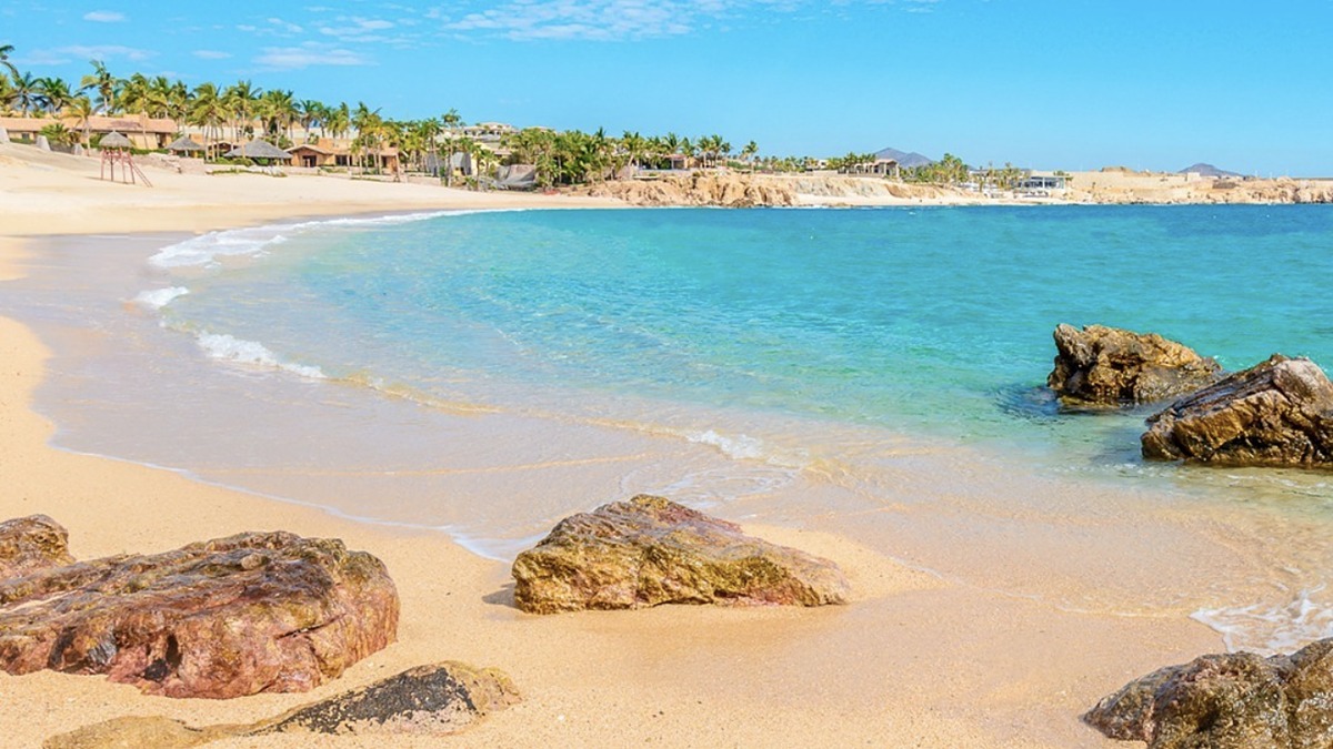 Chileno Bay's Blue Flag certified turquoise water and protected swimming beach