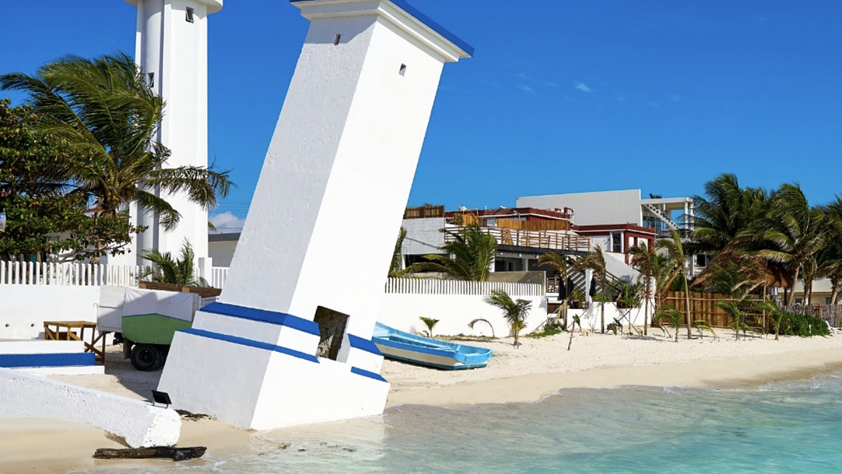 Puerto Morelos, a quiet fishing village beach with calm reef-protected water between Cancun and Playa del Carmen