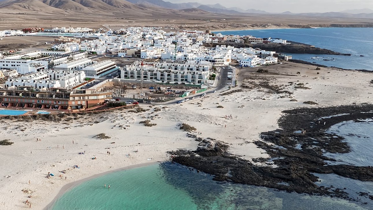 The El Cotillo lagoons on the northwest coast of Fuerteventura, calm clear pools behind volcanic reef