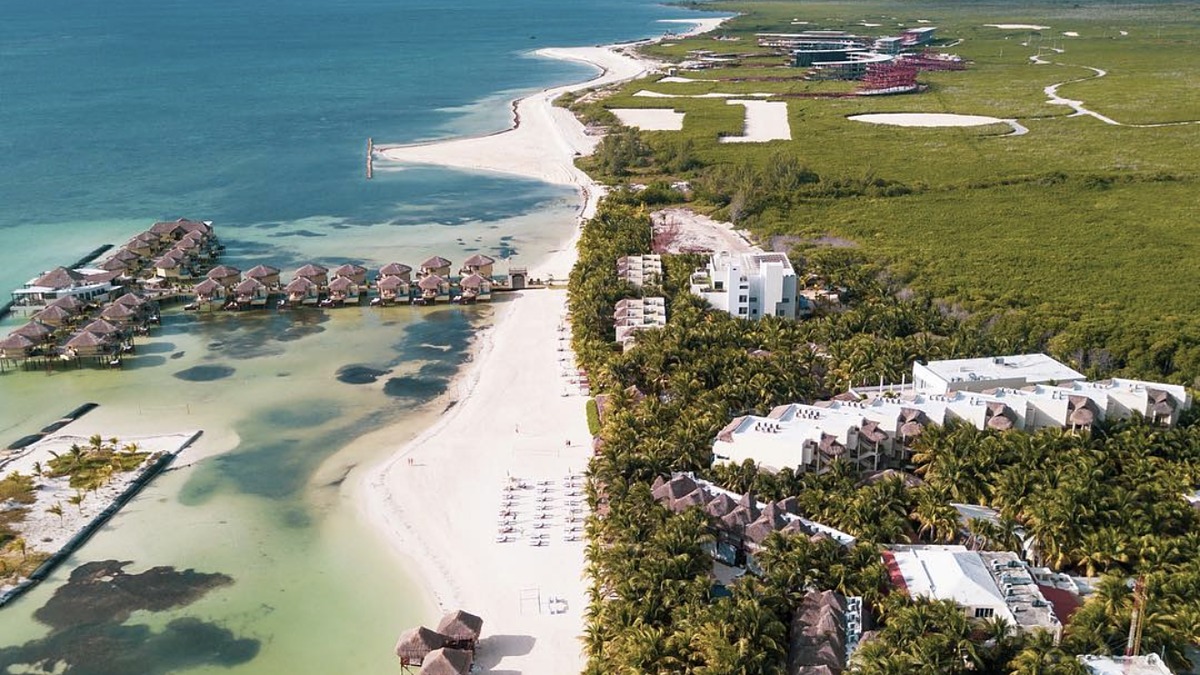 Playa Maroma's powder-white sand and calm turquoise Caribbean water