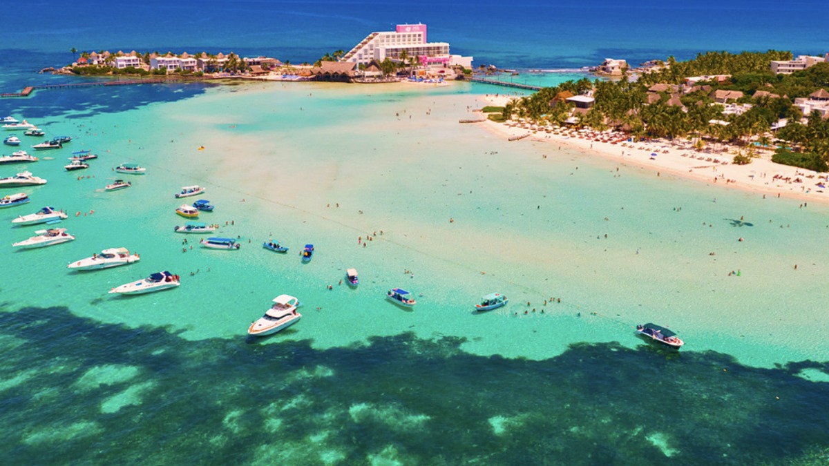Wide turquoise water and white sand at Playa Norte Isla Mujeres