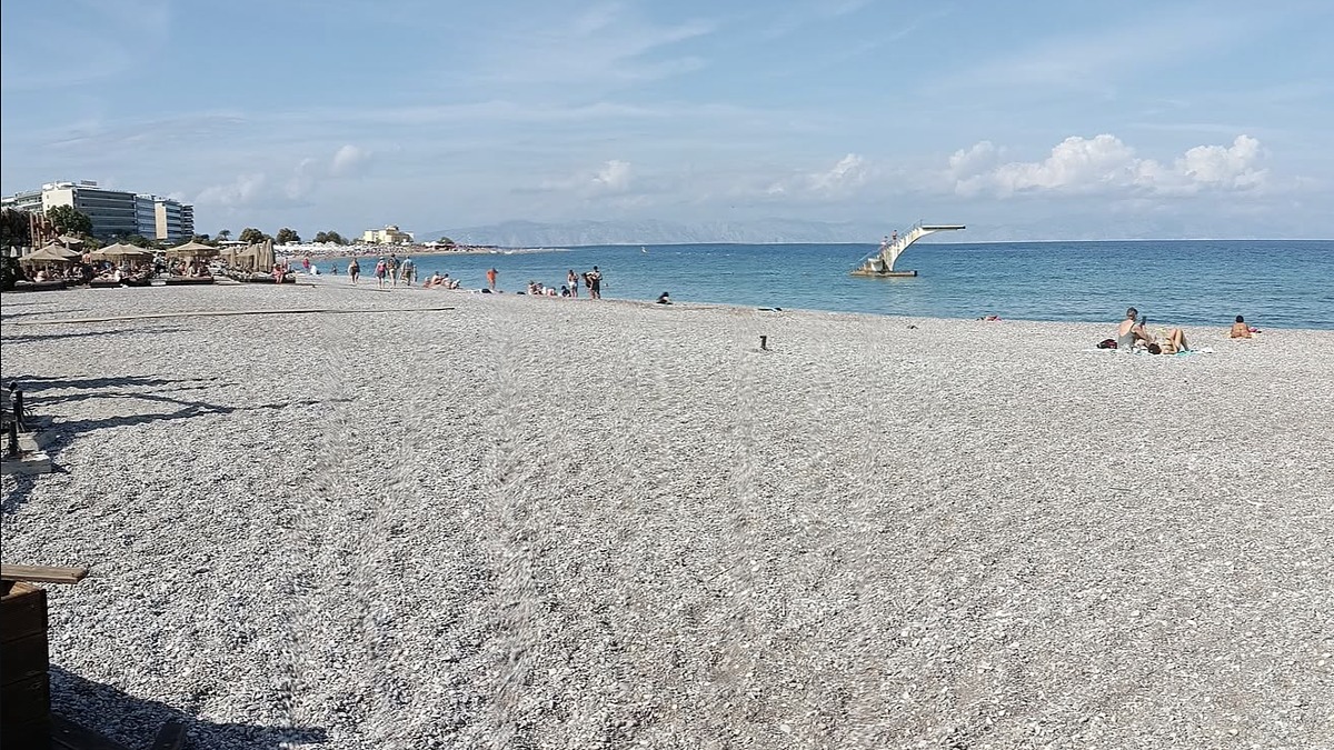 Elli Beach in Rhodes Town, a pebble-and-sand city beach along Mandraki with a diving platform offshore