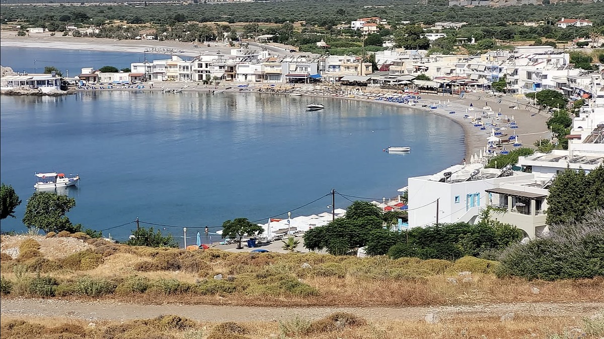 Haraki Beach, a pebble-and-sand crescent fronted by a small village of tavernas on the east coast of Rhodes