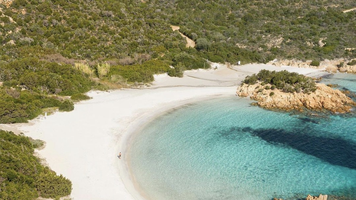 Spiaggia del Principe on the Costa Smeralda, a crescent of soft sand between granite boulders, Sardinia