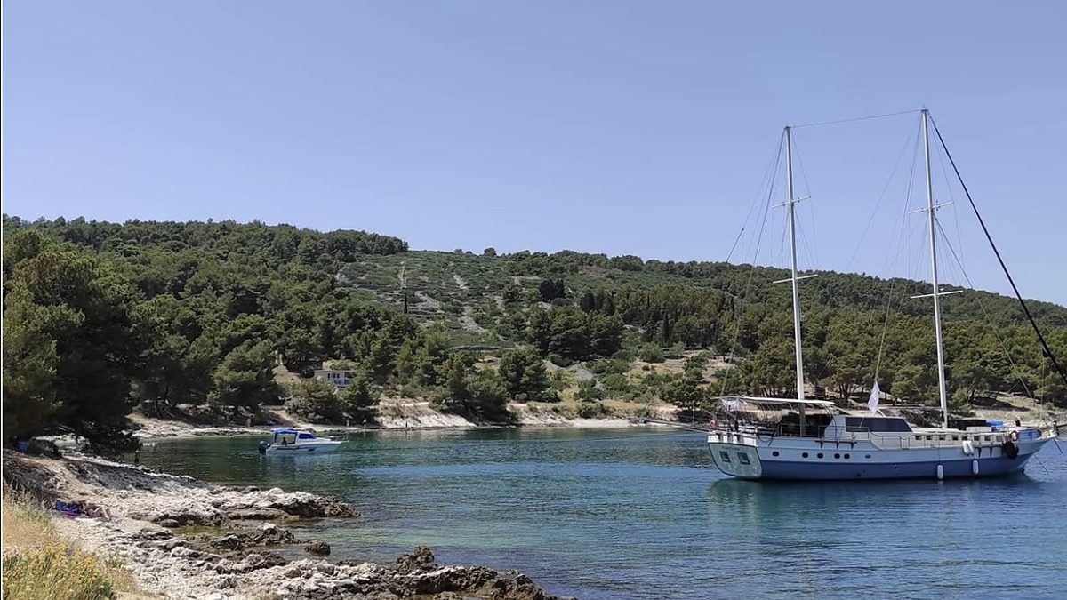 Slatine Beach on Ciovo island near Split, a pebble-and-sand beach with clear water and tavernas