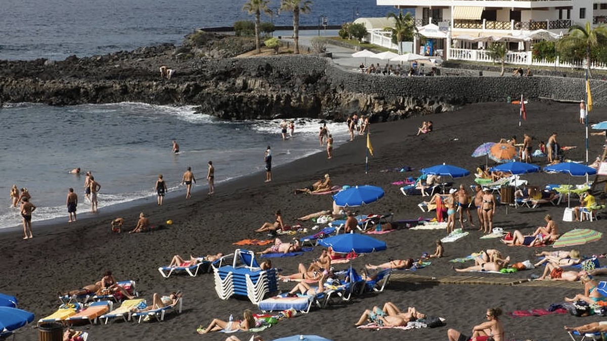 Playa de la Arena, a Blue Flag black-sand beach with a sheltered bay on the west coast of Tenerife