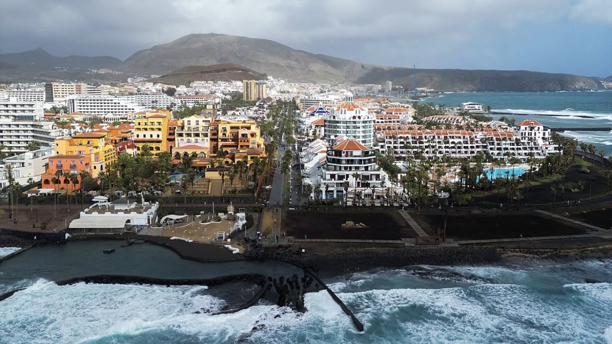 Playa de las Americas, a long dark-sand resort beach lined with hotels on south Tenerife