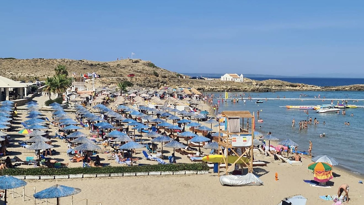 St Nicholas Beach (Skinari) on the northern tip of Zakynthos, a small pebble beach beside the Blue Caves boat port