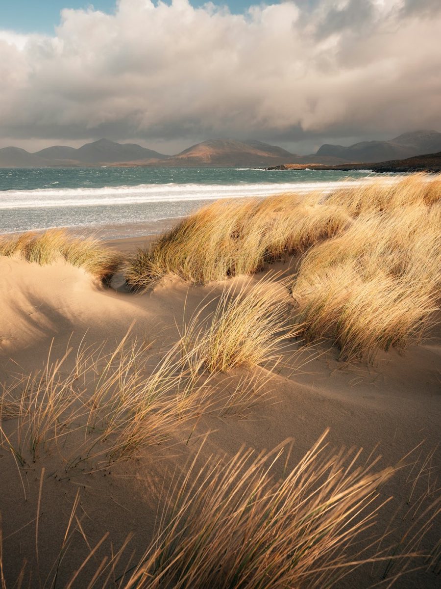 Luskentyre Beach on the Isle of Harris with sand dunes and mountains