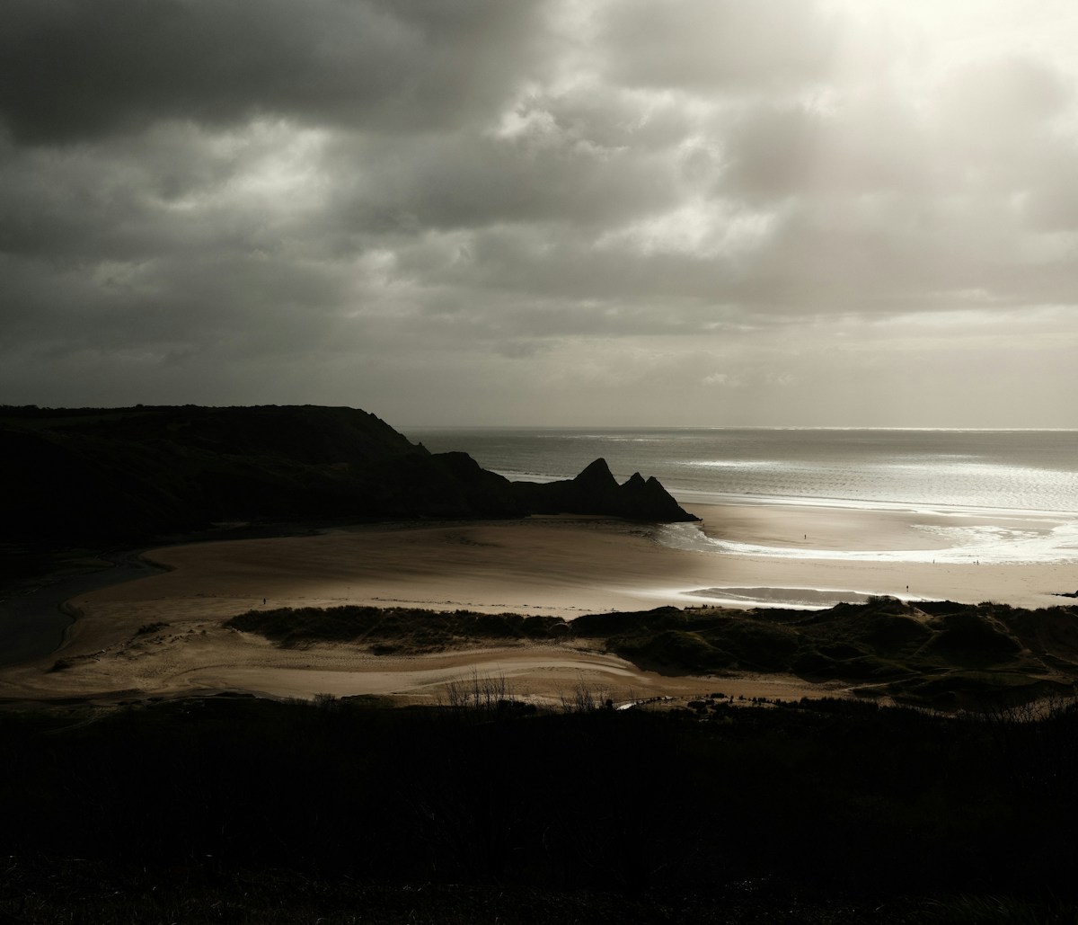 Rhossili Bay on the Gower Peninsula Wales with dramatic coastline