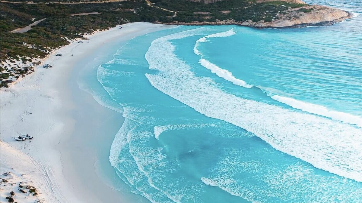 Wharton Beach near Esperance, Western Australia: the curving 4.5km arc of white sand and turquoise water seen from the elevated lookout above the bay